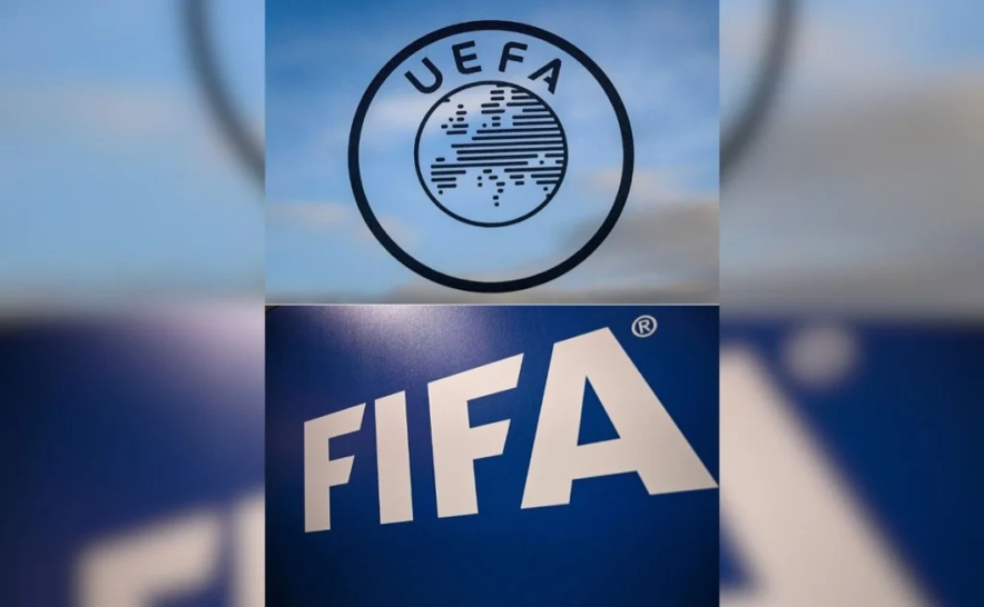 Esta composición de imágenes de archivo, muestra el logotipo de la UEFA en la sede del organismo en Nyon, y el logotipo de la FIFA en la Cumbre Ejecutiva de Futbol de la FIFA en Estambul. La UEFA, organismo rector del futbol europeo, anunció que mantendría su boicot a las Copas del Mundo masculina y femenina de 2026, a pesar de que la FIFA retiró el plan para abrir sus competiciones a la inversión privada. 